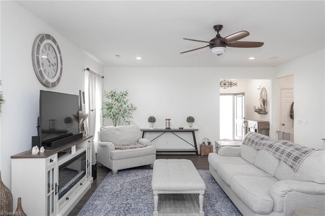 living area featuring ceiling fan, wood finished floors, and recessed lighting