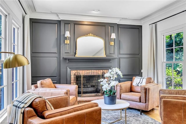 3940 Beechridge Rd, Winston-Salem, NC 27106 - living room with a decorative wall, crown molding, a fireplace, and wood finished floors