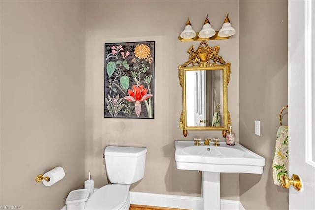 3940 Beechridge Rd, Winston-Salem, NC 27106 - half bath featuring toilet and baseboards