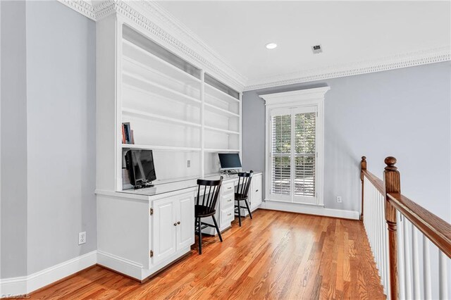 3940 Beechridge Rd, Winston-Salem, NC 27106 - office space with light wood-type flooring, built in desk, baseboards, ornamental molding, and recessed lighting