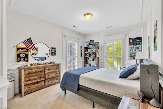 3940 Beechridge Rd, Winston-Salem, NC 27106 - bedroom with a decorative wall, light carpet, multiple windows, access to outside, and ornamental molding