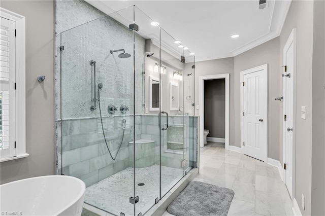 3940 Beechridge Rd, Winston-Salem, NC 27106 - full bathroom with a stall shower, a soaking tub, baseboards, toilet, and crown molding