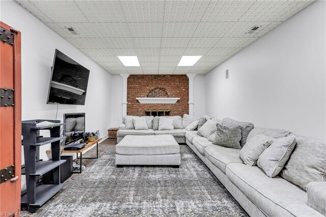 3940 Beechridge Rd, Winston-Salem, NC 27106 - living room with a fireplace, a paneled ceiling, and wood finished floors