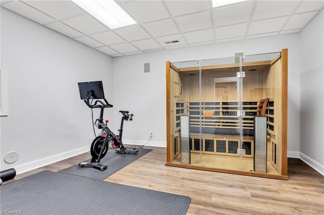3940 Beechridge Rd, Winston-Salem, NC 27106 - workout room featuring a drop ceiling, wood finished floors, a sauna, and baseboards
