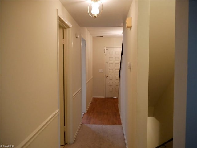 corridor featuring carpet flooring