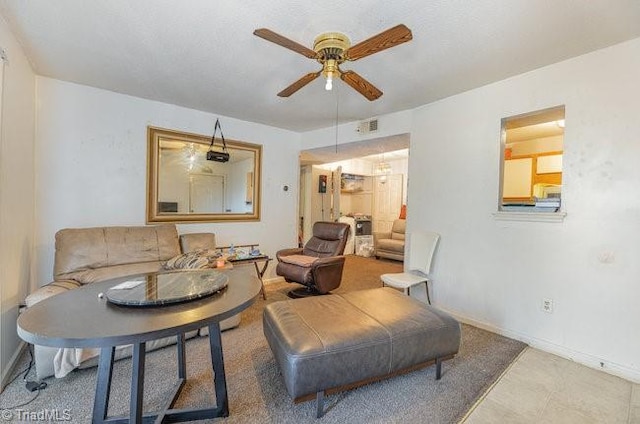 living room with ceiling fan