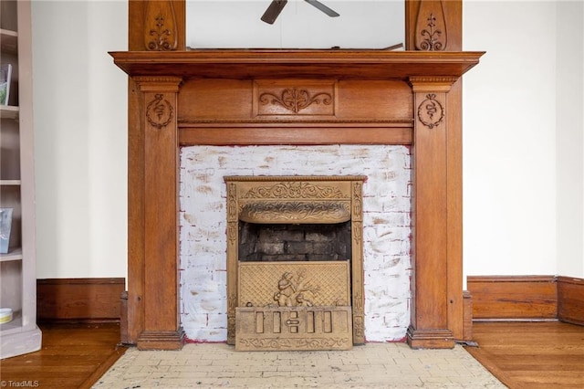 interior details featuring wood-type flooring and ceiling fan