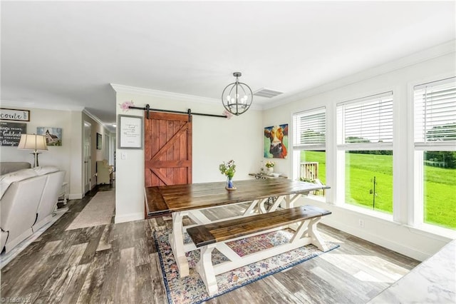 214 Mining Ridge Church Rd, Elkin, NC 28621 - dining room with a barn door, ornamental molding, healthy amount of natural light, wood finished floors, and a chandelier
