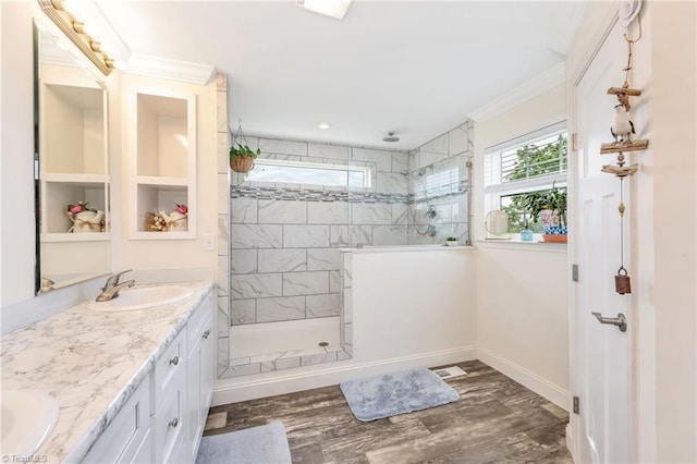 214 Mining Ridge Church Rd, Elkin, NC 28621 - bathroom featuring double vanity, walk in shower, ornamental molding, and wood finished floors