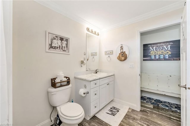 214 Mining Ridge Church Rd, Elkin, NC 28621 - bathroom featuring ornamental molding, vanity, and wood finished floors