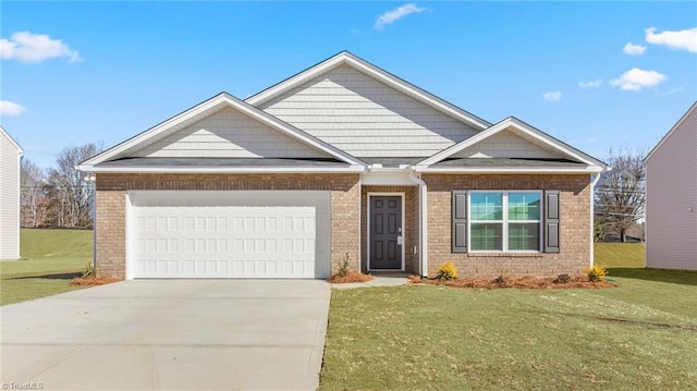 view of front of house featuring a garage and a front yard