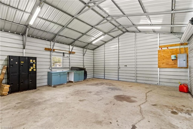 garage featuring metal wall and electric panel