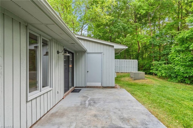 view of patio / terrace featuring fence