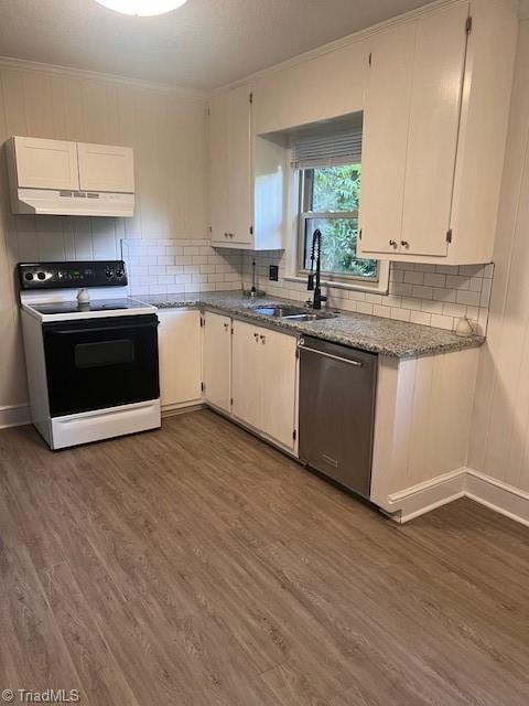 kitchen featuring dishwasher, range hood, sink, white cabinets, and electric stove