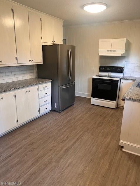 kitchen with tasteful backsplash, electric range, white cabinets, ornamental molding, and dark hardwood / wood-style floors