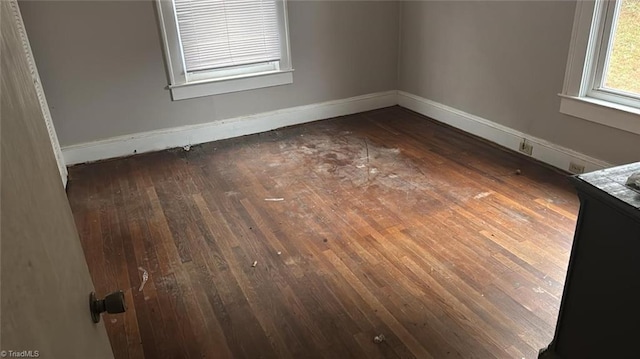 516 Hamilton St, Eden, NC 27288 - empty room featuring baseboards and hardwood / wood-style floors