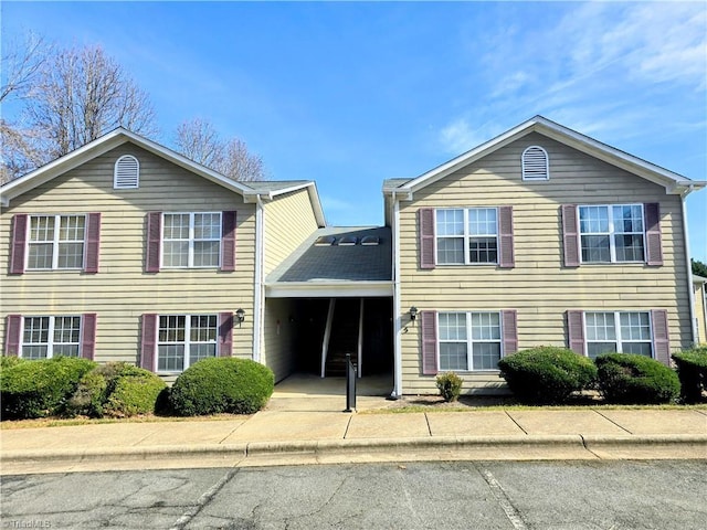 view of front of house featuring a carport