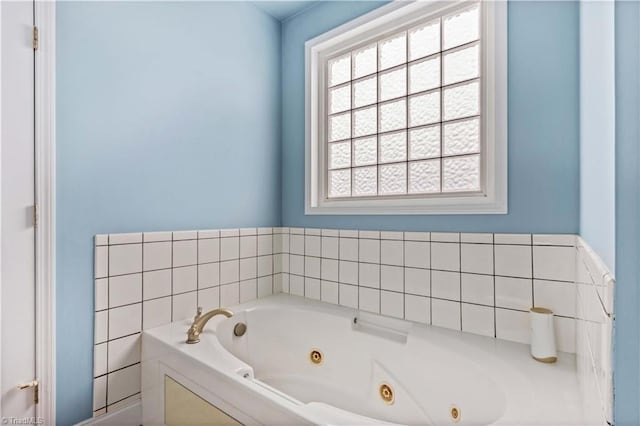 bathroom with a washtub