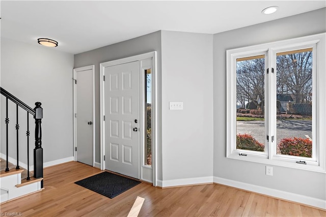 entrance foyer with light wood-type flooring