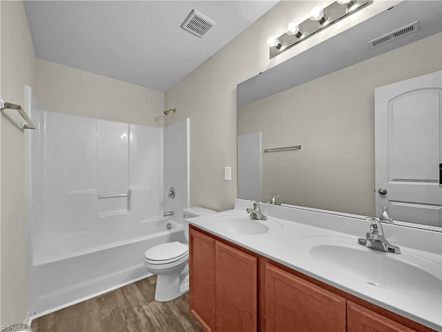 full bath featuring a sink, visible vents, and toilet