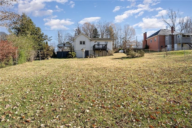 view of yard with a wooden deck