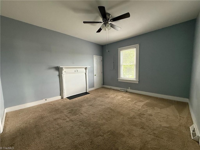 446 Durham St, Mount Airy, NC 27030 - unfurnished room with baseboards, carpet flooring, and a ceiling fan