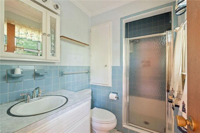 1553 Carson Rd, Pilot Mountain, NC 27041 - full bathroom with a shower stall, crown molding, toilet, vanity, and tile walls