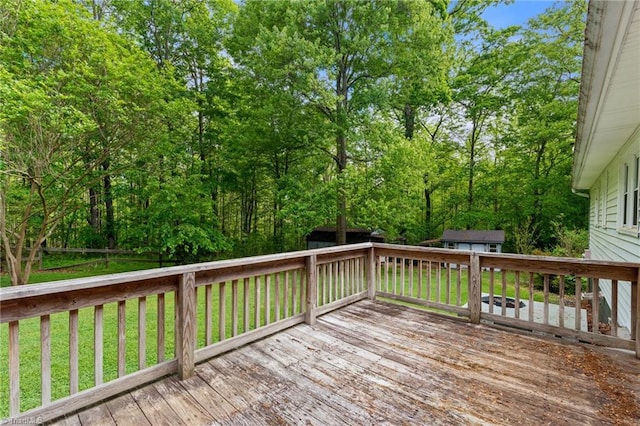 1553 Carson Rd, Pilot Mountain, NC 27041 - wooden terrace with an outdoor structure, a storage shed, and a yard