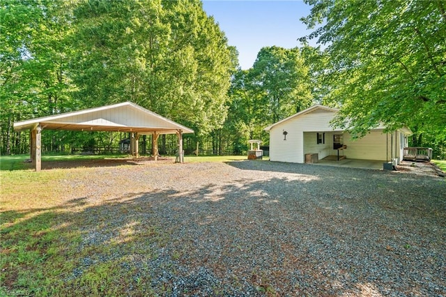 1553 Carson Rd, Pilot Mountain, NC 27041 - view of yard with a detached carport and gravel driveway