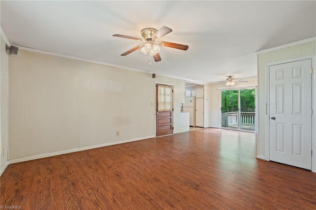 1553 Carson Rd, Pilot Mountain, NC 27041 - empty room featuring a ceiling fan, ornamental molding, wood finished floors, and baseboards