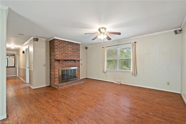 1553 Carson Rd, Pilot Mountain, NC 27041 - unfurnished living room with ceiling fan, wood finished floors, crown molding, a fireplace, and baseboards