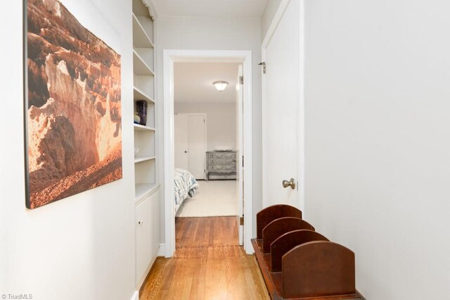 bedroom with light hardwood / wood-style floors