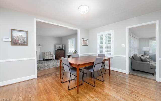 dining room featuring light hardwood / wood-style flooring