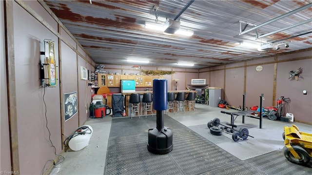exercise room with a garage