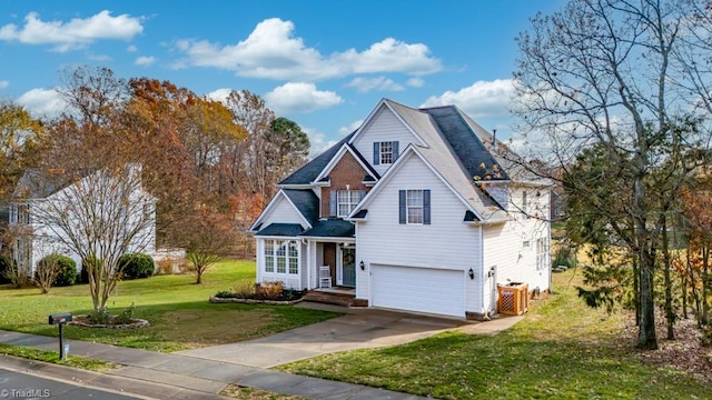 view of front of house featuring a front yard and a garage