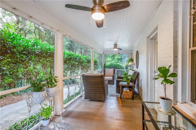 exterior space featuring ceiling fan