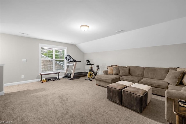 living room featuring baseboards, vaulted ceiling, visible vents, and carpet floors
