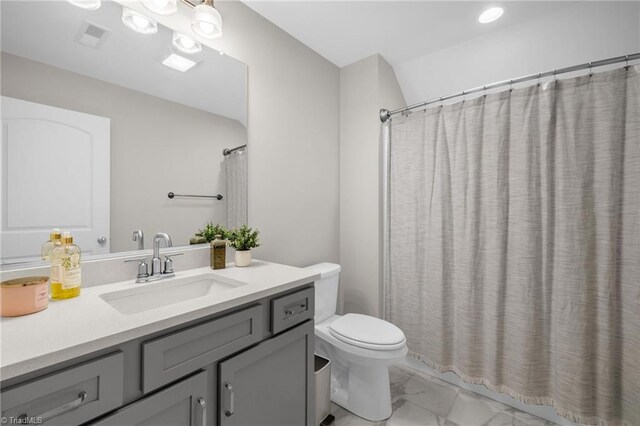 full bath featuring vanity, marble finish floor, a shower with curtain, toilet, and visible vents