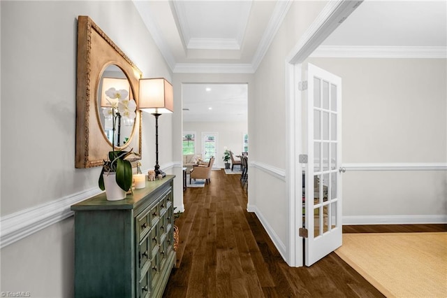 corridor with baseboards, crown molding, dark wood-type flooring, and recessed lighting