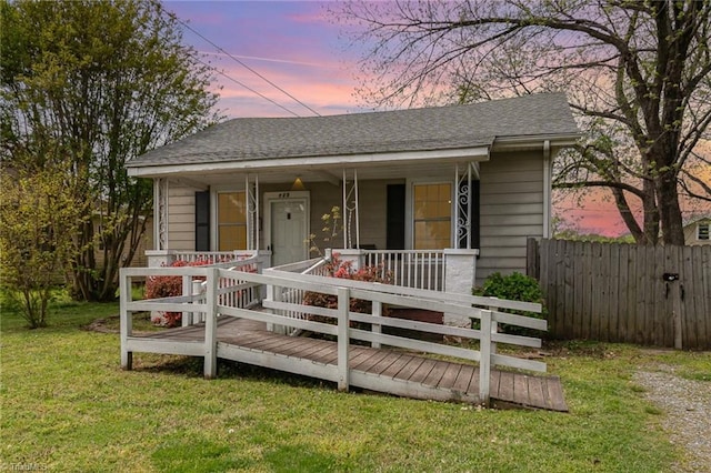 725 S Beaumont Ave, Burlington, NC 27217 - bungalow featuring fence, a porch, a yard, and a shingled roof