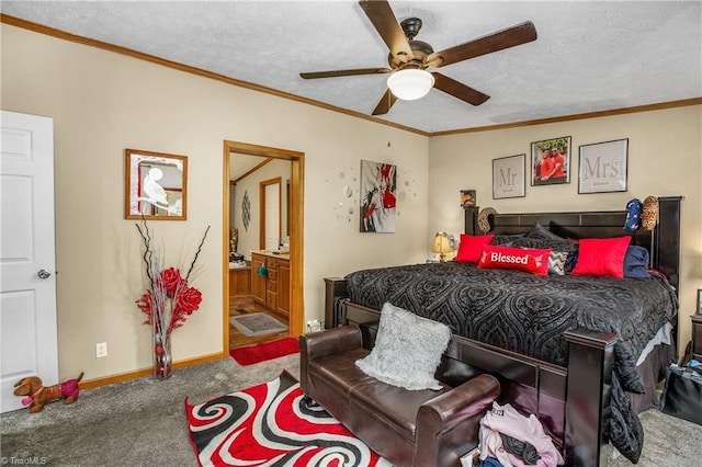 carpeted bedroom featuring ceiling fan, crown molding, a textured ceiling, and connected bathroom