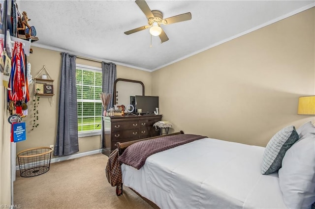 bedroom featuring ceiling fan, light carpet, and ornamental molding