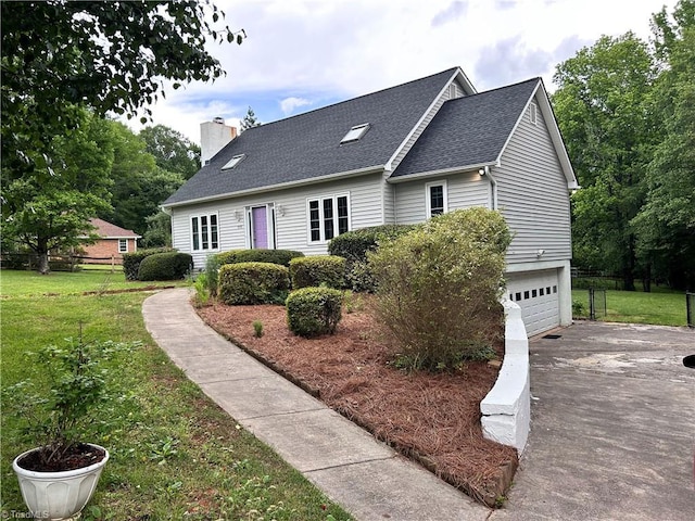 5701 Hornsway Dr, Winston-Salem, NC 27104 - cape cod house featuring driveway, an attached garage, roof with shingles, and a chimney