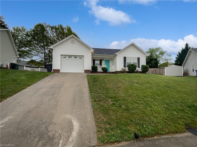 582 Bost Xing, Kernersville, NC 27284 - ranch-style house with driveway, a garage, fence, and a front lawn