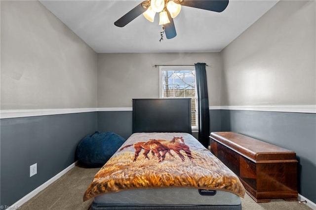 bedroom with baseboards, carpet floors, and ceiling fan