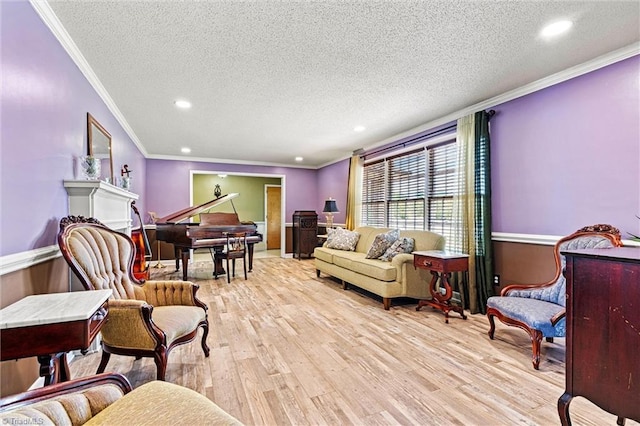 living room featuring crown molding, wood finished floors, a textured ceiling, and recessed lighting