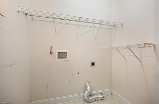 clothes washing area featuring hookup for a washing machine, laundry area, hookup for an electric dryer, and baseboards