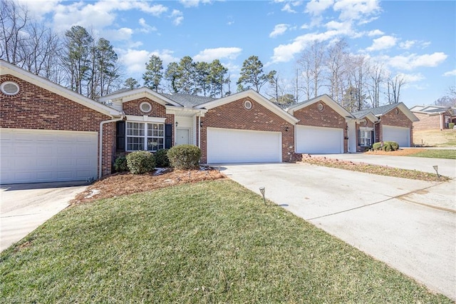 ranch-style house with a front lawn, concrete driveway, brick siding, and an attached garage