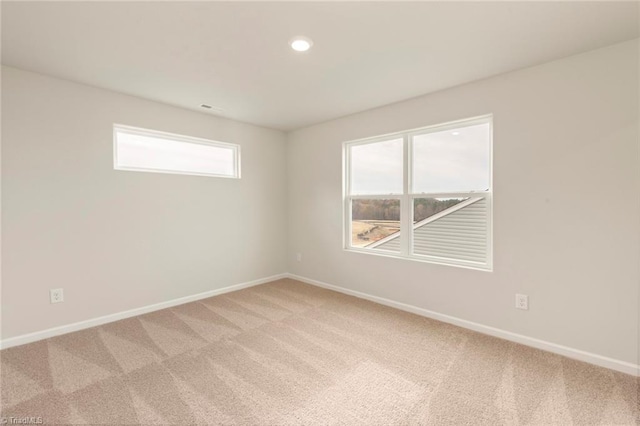 unfurnished room with carpet