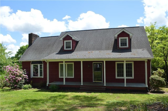 117 Ridgecrest Dr, Mount Airy, NC 27030 - view of front facade with a porch, a front yard, and a chimney